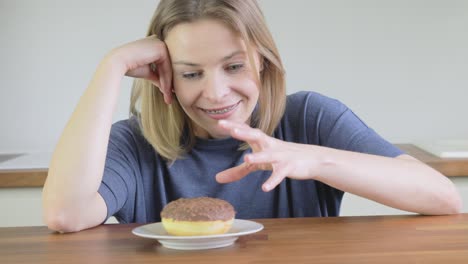 A-woman-is-saved-from-cheating-on-her-diet-by-a-disappearing-donut