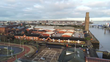 Woodside-ferry-village-terminal-aerial-pan-right-to-view-across-Liverpool-harbour-skyline