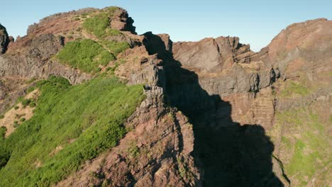 Aerial-circling-around-Miradouro-do-Ninho-da-Manta-on-volcanic-Madeira-island