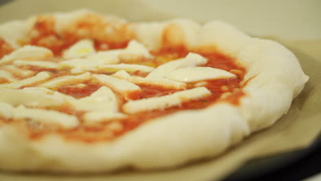 A-delicious-Margherita-pizza-while-cooking,-sizzling-and-bubbling