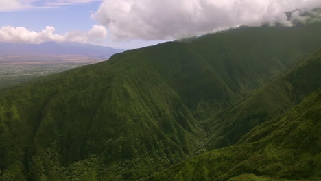 Green-mountain-range,-Maui-island,-Hawaii,-high-altitude-rainforest-aerial-view