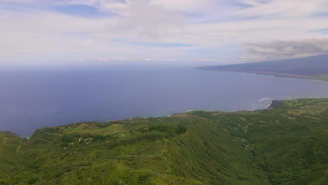 Subtle-clouds-over-Maui-coast-and-Pacific-Ocean,-Waihee-Ridge-aerial-view