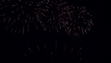 Splendid-Fireworks-Displays-at-Night-Sky-at-Celebration-Event,-Slow-Motion