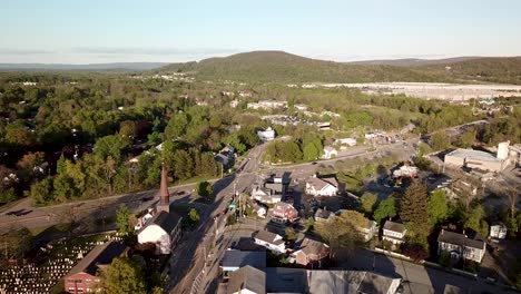 Downtown-Fishkill-and-the-Hudson-Highlands-mountains-in-New-York's-Hudson-Valley-is-shown-in-this-1080-aerial-footage