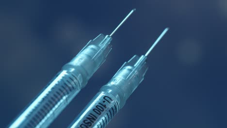 Macro-view-of-two-syringes-for-both-doses-of-the-coronavirus-vaccine---isolated-with-particle-background