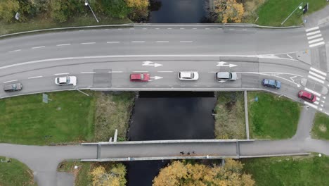 Aerial-view-of-bridge-crossing-in-Partille,-Sweden,-wide-shot-overhead