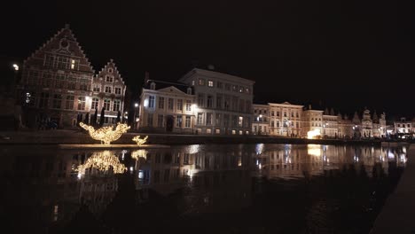 Buildings-At-Korenlei-Quay-With-Leie-River-In-Foreground-At-Night-In-Ghent,-Belgium