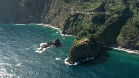 Breathtaking-natural-cliffs-of-lush-Atlantic-Madeira-island-with-blue-water