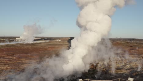 Steam-rises-from-popular-Gunnuhver-geyser-with-tourist-viewing-platform