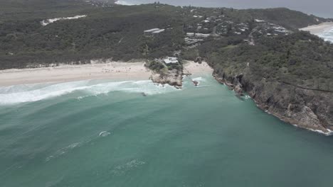 Turquoise-Blue-Sea-With-Main-And-South-Gorge-Beach-In-Headland-Park---Point-Lookout,-North-Stradbroke-Island,-QLD,-Australia