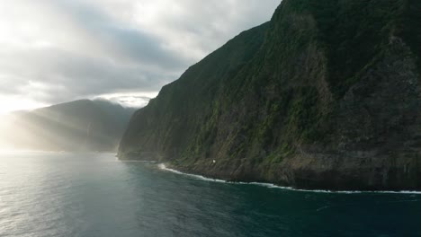 Pristine-Madeira-coast-with-rocky-heights-and-scenic-sunbeams-from-sunrise