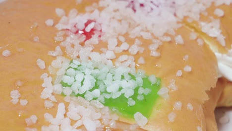 Candied-Fruit-and-Sugar-on-Roscon-De-Reyes-Christmas-Pastry,-Closeup-Detail