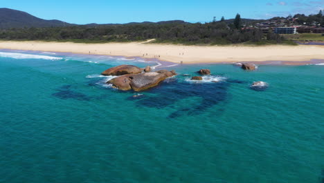 Amazing-South-West-Rocks-beach-in-New-South-Wales,-Australia,-aerial-arc-shot