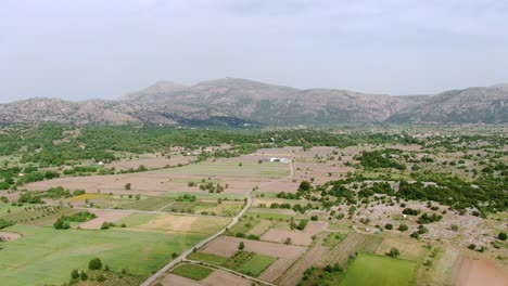 Aerial-Parallax-View-Over-Agriculture-Farm-Fields-In-Lastihi-in-Crete