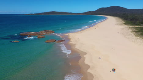 Amazing-Australian-beaches,-idyllic-South-West-Rocks-coastline,-aerial-reveal