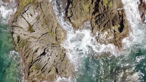 Corkscrew-Drone-footage-of-the-Mediterranean-sea-hitting-rock-formations