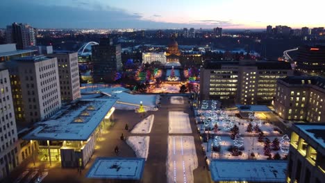 4k-Twilight-Aerial-fly-over-LED-runway-winter-post-Modern-Provincial-Legislature-Buildings-centered-with-a-Beaux-Arts-dome-rooftop-government-structure-of-Capital-City-of-Edmonton-Alberta-Canada-3-4