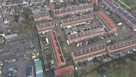 Aerial-of-overview-of-solar-panels-on-rooftops-in-suburban-neighborhood