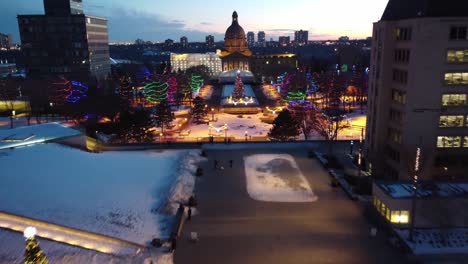 4k-Twilight-Aerial-fly-over-LED-runway-quiet-winter-post-Modern-Provincial-Legislature-Buildings-centered-with-a-Beaux-Arts-dome-top-government-structure-of-Capital-City-Edmonton-Alberta-Canada-4-4