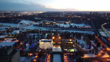 Aerial-Twilight-Evening-over-the-Capital-City-of-Edmonton-Alberta-Canada-duringthe-holiday-season-of-the-COVID19-pandemic-with-hardly-any-people-out-dolly-roll-over-new-n-old-government-buildings-1-5