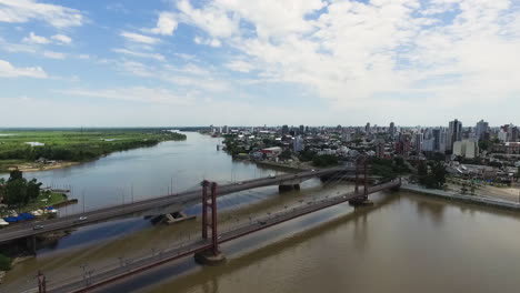 Aerial-View-of-Santa-Fe-City-Bridges-and-Traffic-Above-River-on-Sunny-Summer-Day-,-Argentina