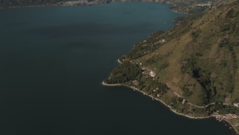 Drone-aerial-bird's-eye-view-of-beautiful-lake-Atitlan-and-the-mountains-around-it-in-Guatemala