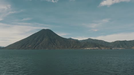 Drone-aerial-landscape-view-of-volcanoes-and-lake-Atitlan-in-Guatemala