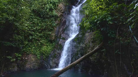 Static-shot-of-a-beautiful-waterfall-hidden-in-the-tropical-rainforest-jungle-on-Koh-Chang