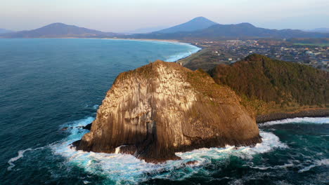 Wide-drone-shot-of-Kyushu-Japan's-coastline-and-bay
