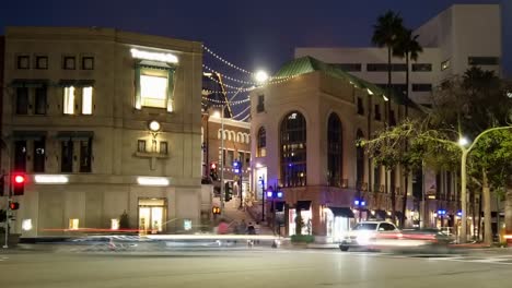 Fast-moving-timelapse-traffic-light-trails-on-downtown-Rodeo-drive-nightlife-scene