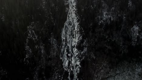 Flyover-Frozen-Waterfall-In-Vallee-Bras-Du-Nord-Quebec-Canada-In-Winter---aerial-shot
