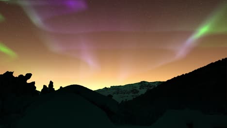 dark-ice-mountain-peaks-with-auroras-in-a-clear-sky