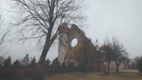 The-ruins-of-the-medieval-Cistercian-fortified-church-in-the-town-of-Cisnadioara,-Sibiu-County,-Romania