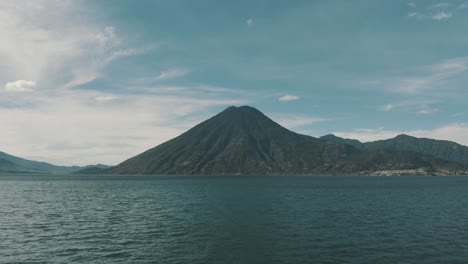 Drone-aerial-flying-towards-San-Pedro-Volcano-in-Lake-Atitilan,-Guatemala