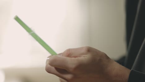 Man's-Hand-Removed-The-Plastic-Cover-Of-Drinking-Straw---Removing-Wrapper-Of-Drinking-Tube