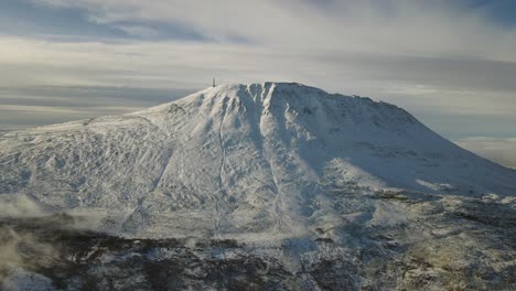 Panning-drone-footage-of-Mount-Gaustatoppen-at-sunrise