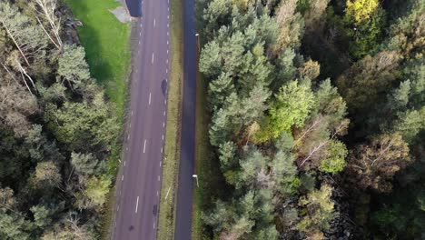 Drone-top-down-view-over-road-through-Gothenburg-suburbs
