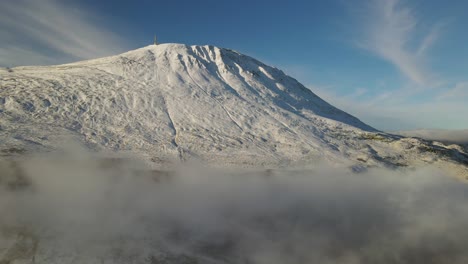 Zooming-out-footage-of-Mount-Gaustatoppen