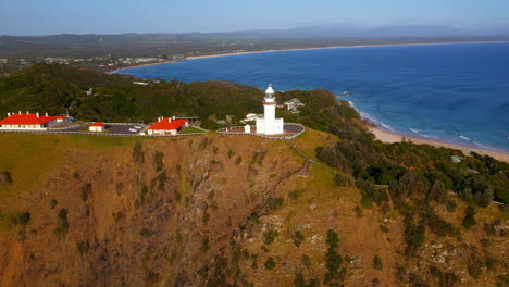 Wide-rotating-drone-shot-of-Cape-Byron-Lighthouse,-Australia