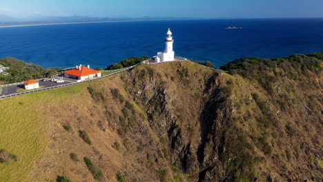 Rotating-drone-shot-of-Cape-Byron-Lighthouse,-Australia