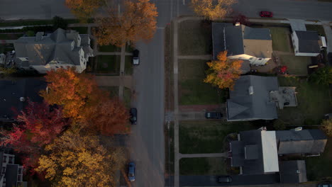 Aerial-pulling-back-and-tilting-up-over-a-beautiful-street-in-a-Kirkwood-neighborhood-in-St
