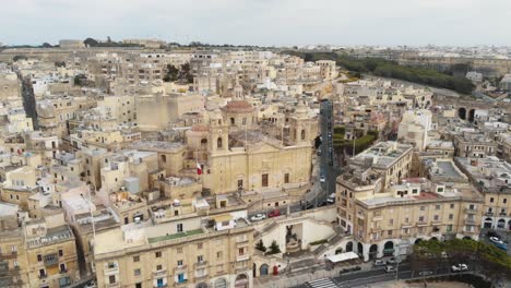 Slow-pan-aerial-4k-drone-footage-of-the-cityscape-of-the-densely-populated-Mediterranean-island,-Malta,-and-it's-well-known-'Three-Cities