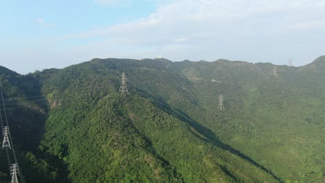 High-altitude-early-morning-shot-over-Hong-Kong-Lion-rock-mountain-ridge,-Aerial-view