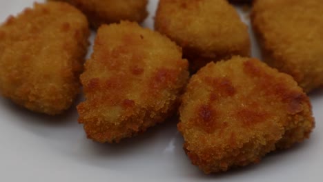 Baked-crispy-chicken-nuggets-on-white-plate