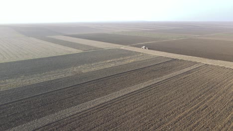 Dramatic-wide-sweeping-views-of-large-scale-industrial-farm-lands---Drone-footage