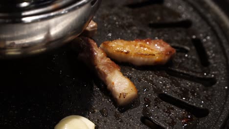 Samgyeopsal---Sizzling-Korean-Pork-Belly-In-Charcoal-Griller-In-A-Korean-Restaurant
