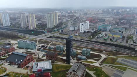 Aerial-Flying-Over-Modern-Buildings-Of-Old-Mine-And-Highway-Katowice-4K