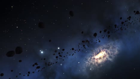 Asteroid-rocks-fall-in-space-with-a-background-of-a-galaxy