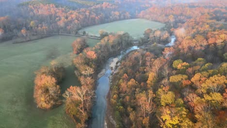 4K-drone-footage---Following-a-creek-during-sunrise