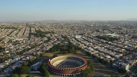 Aerial-Approach-to-Bull-Fighting-Stadium-in-Guadalajara,-Mexico